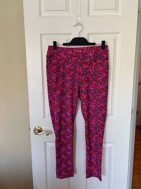 Lilly Pulitzer Luxletic Passionfruit Pink and Navy Star Searching print pants.